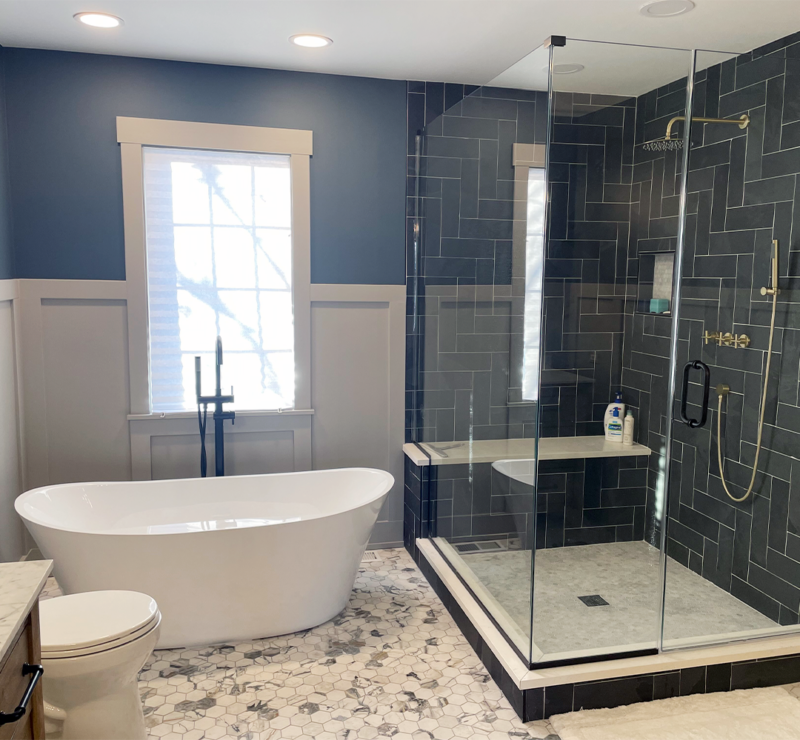 Gray Contemporary Farmhouse Bathroom White Bathtub and Glass Shower