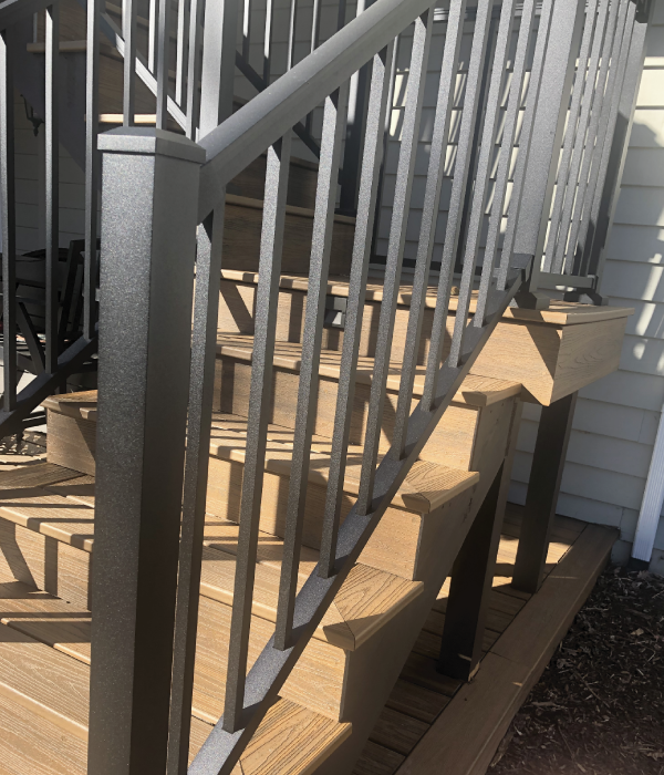 Residential Exterior Stairs with Black Railings and Spindles