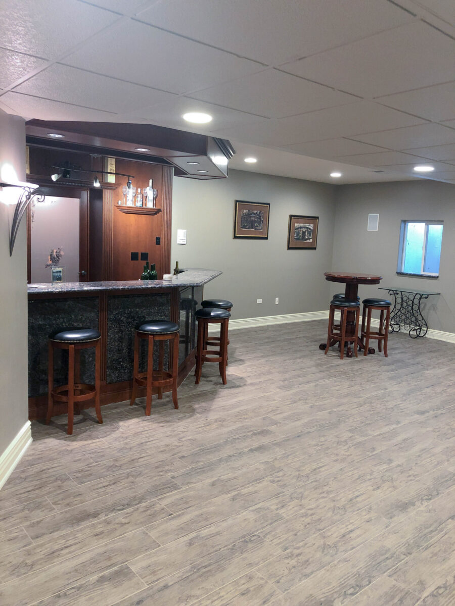 Traditional Style Basement Bar with Dark Wood