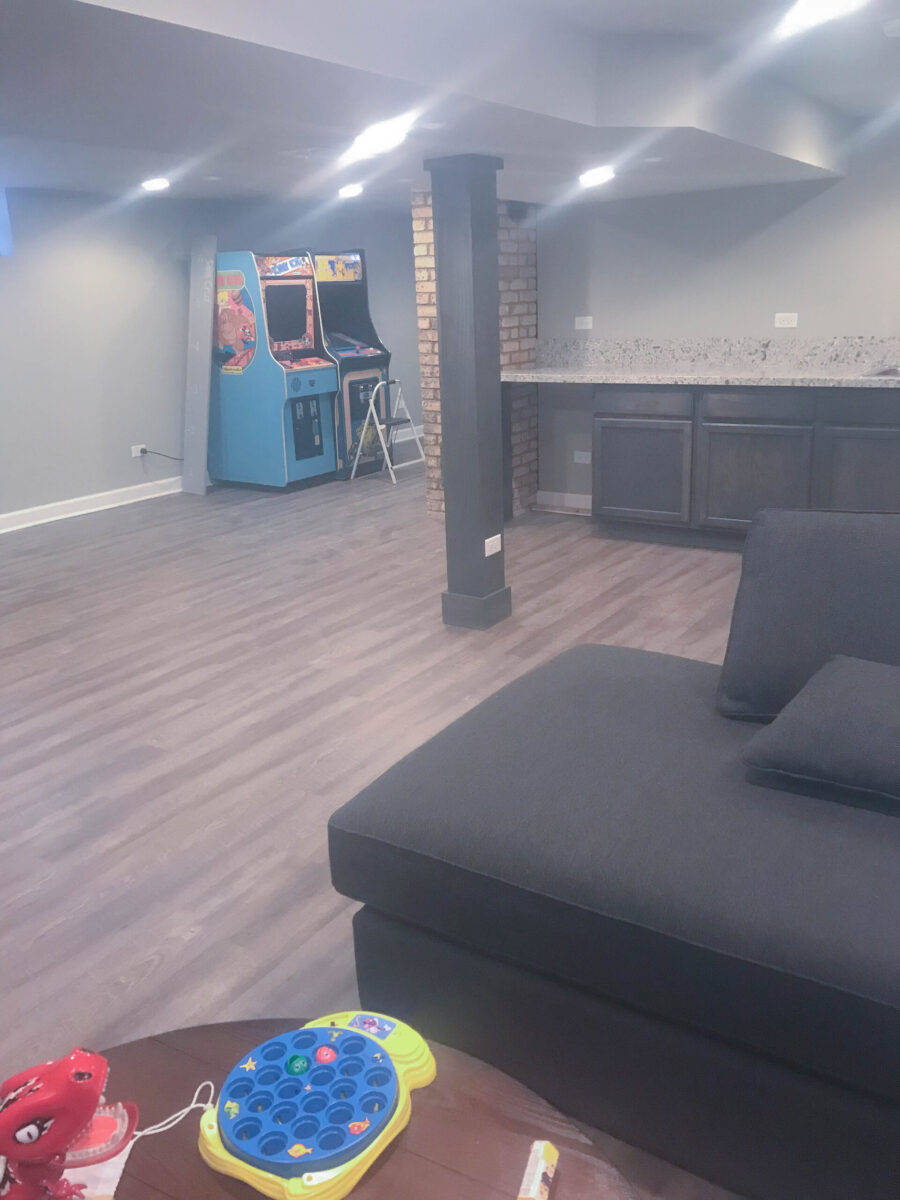 Basement Living Room with Gaming Area and Wet Bar