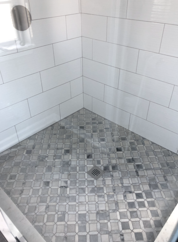 Contemporary Glass Shower with White Tile and Gray Tile Flooring