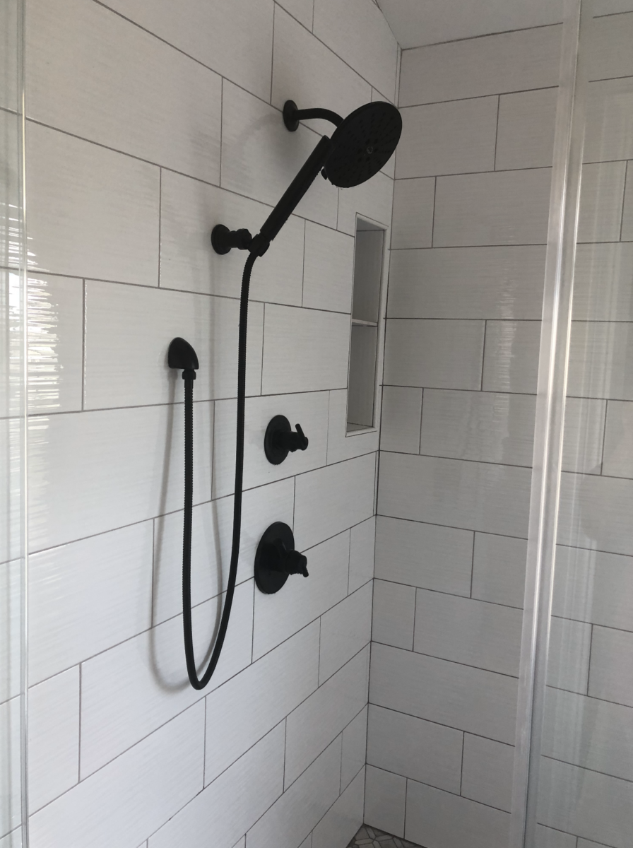 Contemporary Glass Shower with White Tile and Black Hardware