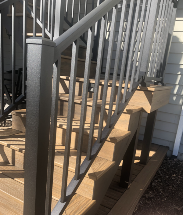 Residential Exterior Stairs with Black Railings and Spindles