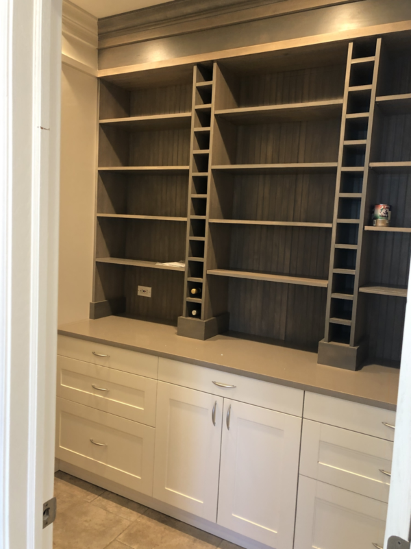 Built-in Shelving with Wine Storage and Wooden Interior Finishes